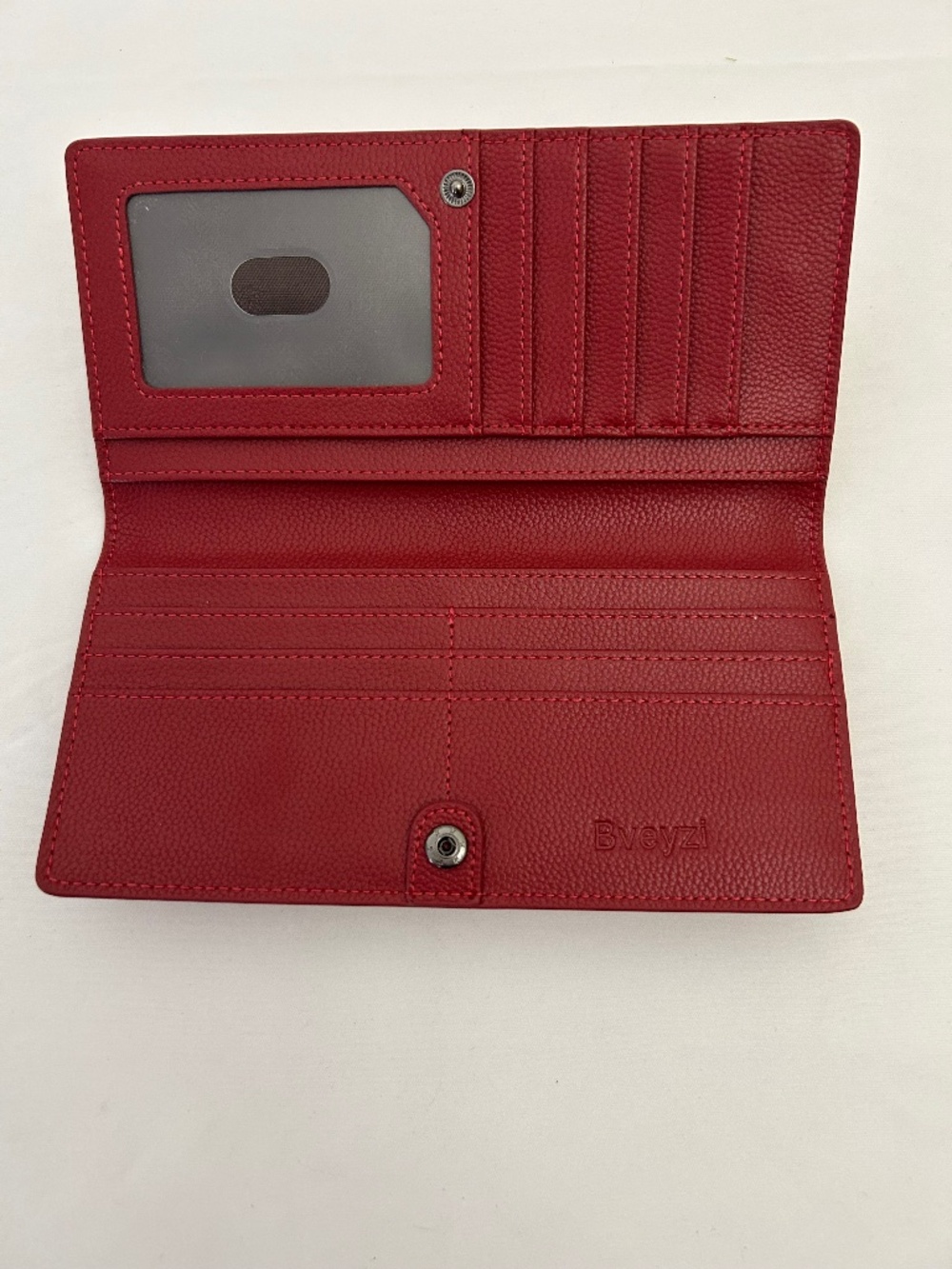 Bveyzi Ultra Slim RFID Blocking Leather Wallet in red.